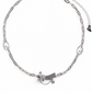 A silver-toned chain necklace featuring a central meteor or shooting star charm with small star accents, displayed on a clean white background.